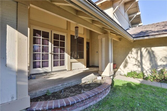 doorway to property with french doors