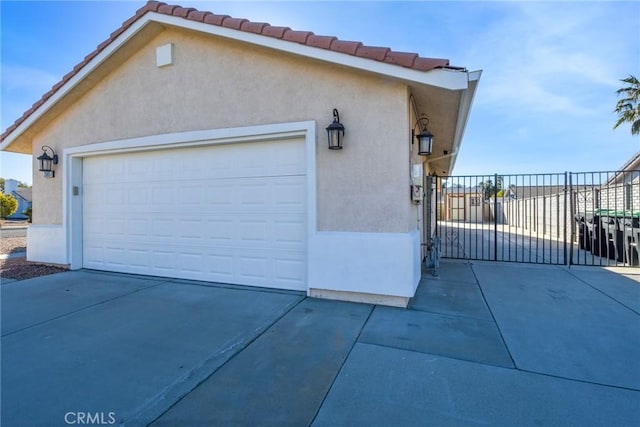 view of property exterior featuring a garage