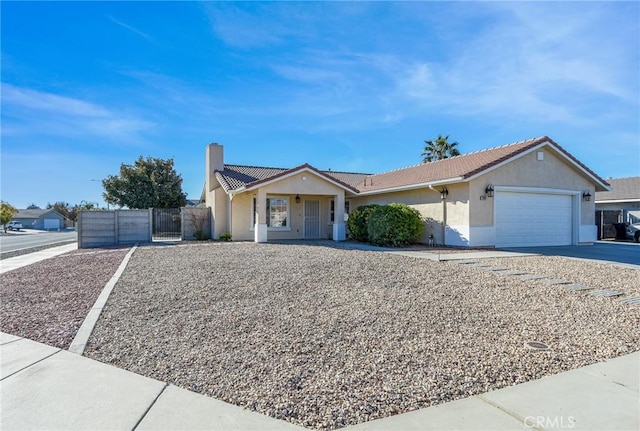 ranch-style home with a garage