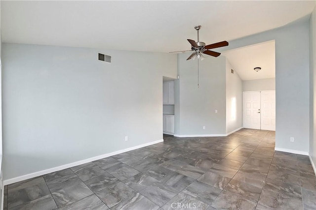 unfurnished room with vaulted ceiling and ceiling fan