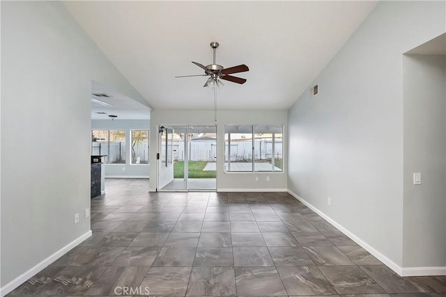 unfurnished room featuring ceiling fan and lofted ceiling