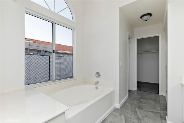 bathroom featuring a tub