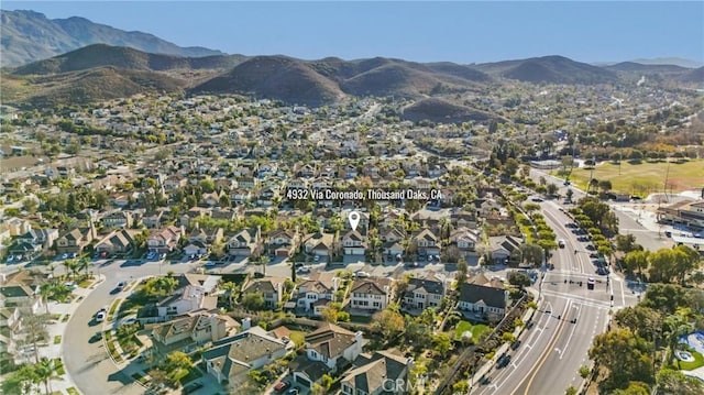 bird's eye view with a mountain view