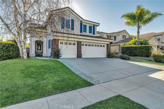 view of front property featuring a front yard and a garage