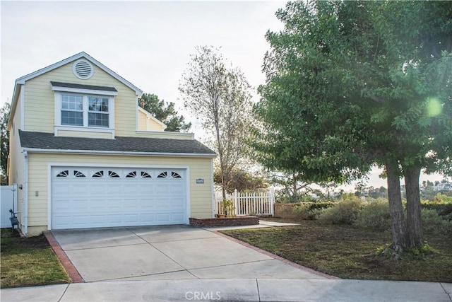 view of front of property with a garage