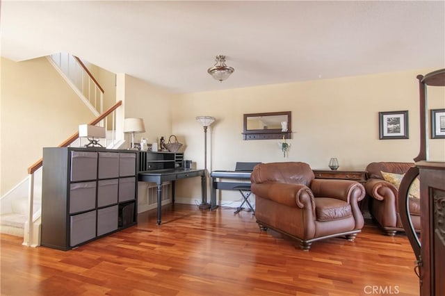 living area with wood-type flooring