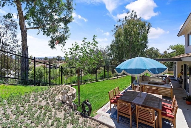 view of yard with a patio area and an outdoor living space