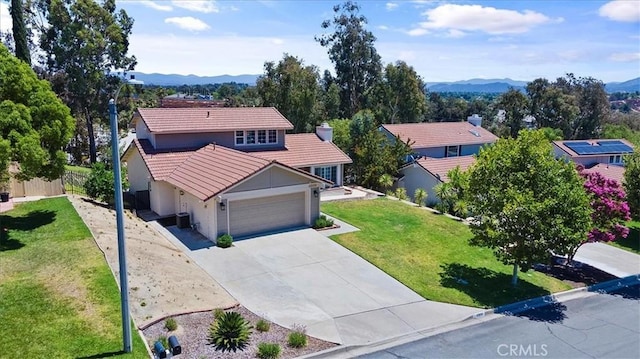 drone / aerial view featuring a mountain view