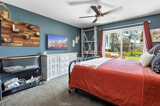 carpeted bedroom with access to exterior and ceiling fan