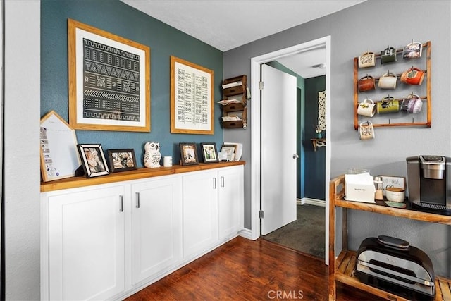 interior space with dark wood-type flooring