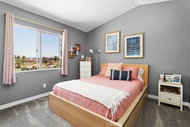 carpeted bedroom featuring vaulted ceiling