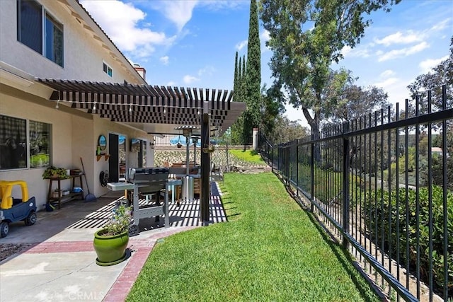 view of yard with a pergola and a patio