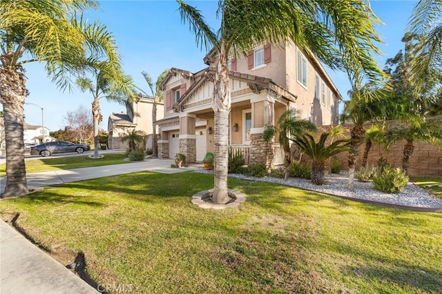 view of front of home with a garage and a front yard