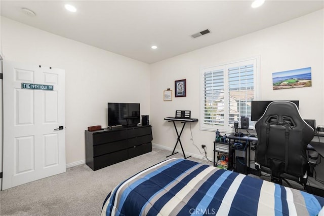 bedroom with light carpet