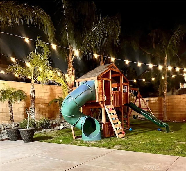 view of playground at night