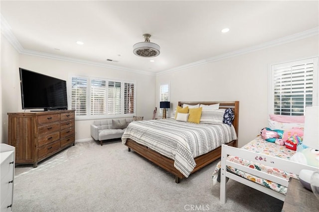 carpeted bedroom featuring ornamental molding