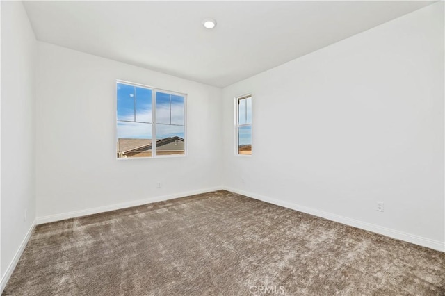 view of carpeted spare room