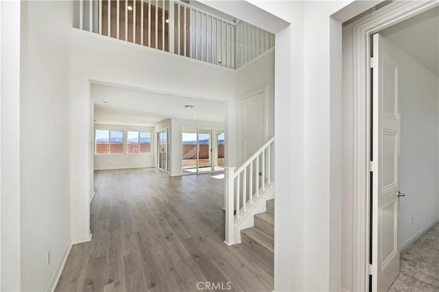 hallway featuring hardwood / wood-style flooring