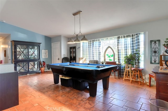 recreation room with vaulted ceiling and pool table