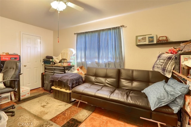 tiled living room featuring ceiling fan