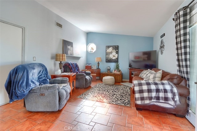 living room with vaulted ceiling