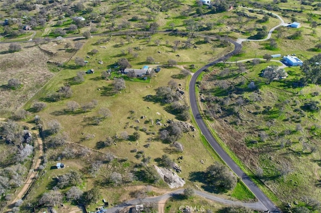 birds eye view of property featuring a rural view