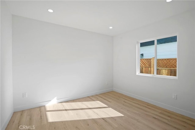 empty room with light wood-type flooring