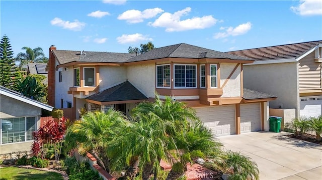 view of front of property with a garage