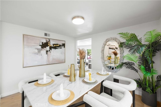 dining room featuring light wood-type flooring