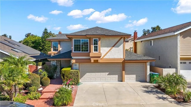 front of property featuring a garage