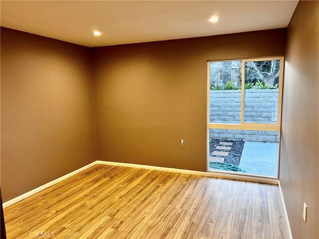 2328 Via Mariposa W Unit B, Laguna Woods, CA 92637 - empty room with recessed lighting, baseboards, and wood finished floors