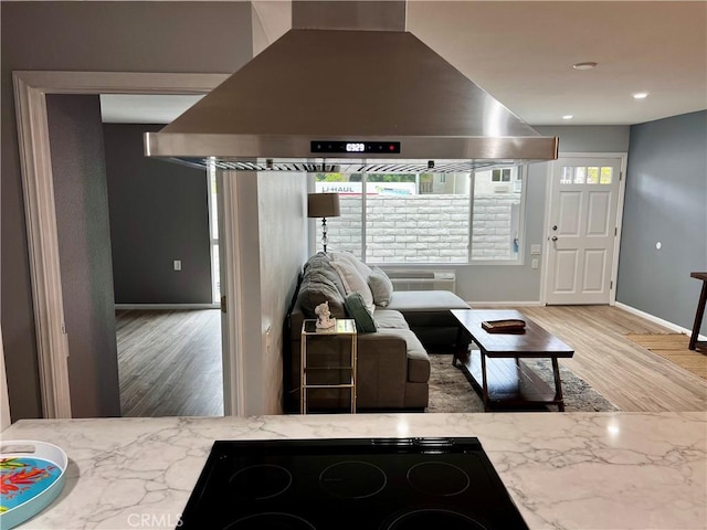 2328 Via Mariposa W Unit B, Laguna Woods, CA 92637 - living room featuring baseboards, recessed lighting, and wood finished floors