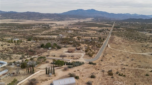 drone / aerial view featuring a mountain view