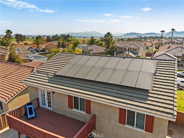 exterior space featuring a residential view and a mountain view