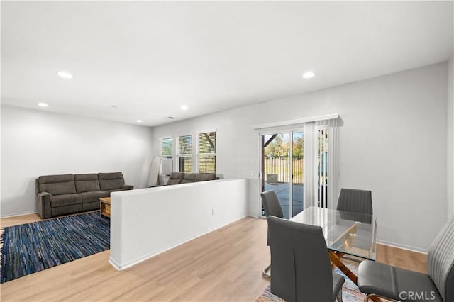 dining area with light wood-type flooring