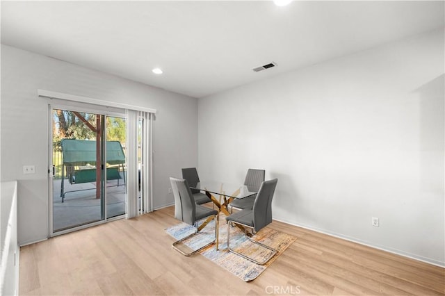 dining room featuring light hardwood / wood-style flooring