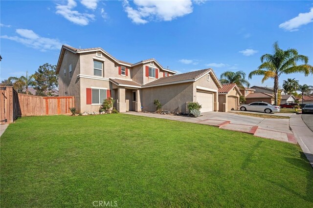 view of front facade featuring a front yard and a garage