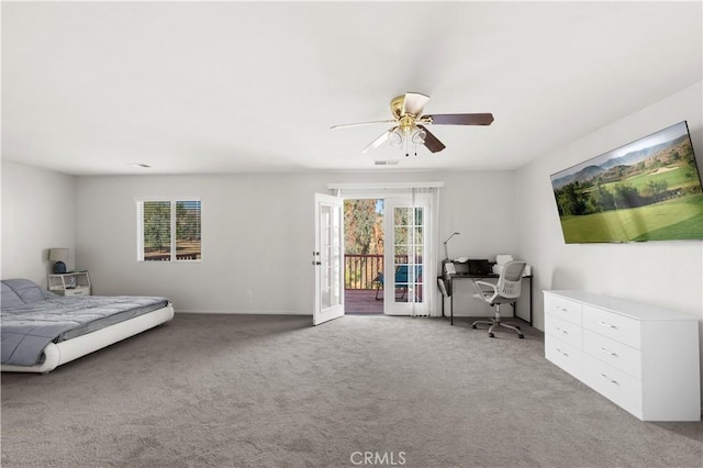 unfurnished bedroom featuring ceiling fan, visible vents, access to outside, french doors, and carpet