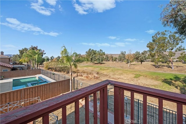 exterior space featuring a rural view and a pool