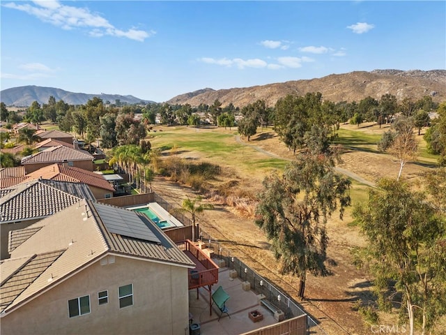 birds eye view of property featuring a mountain view