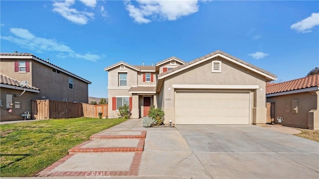 view of front of house featuring a front lawn and a garage