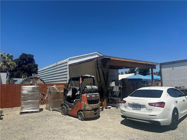 view of parking featuring a carport