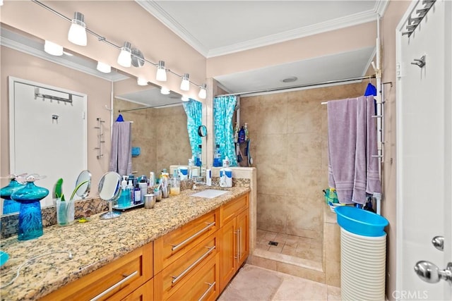 bathroom featuring tile patterned floors, a shower with curtain, crown molding, and vanity