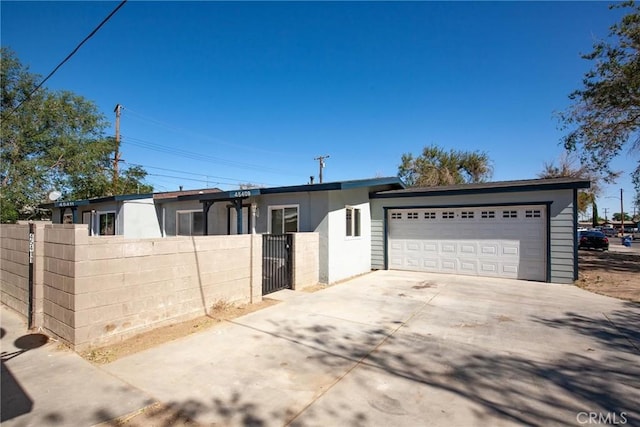 ranch-style home featuring a garage