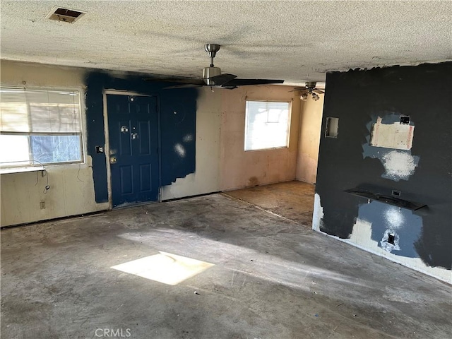 entrance foyer with a textured ceiling