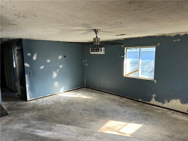 spare room featuring a textured ceiling