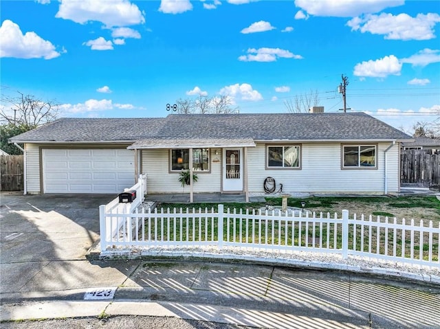 ranch-style house featuring covered porch, a garage, and a front lawn