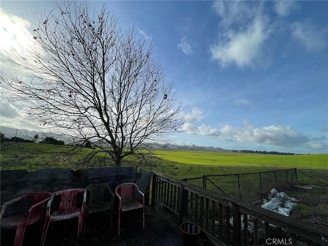 view of yard with a rural view