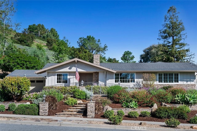 ranch-style home with a garage