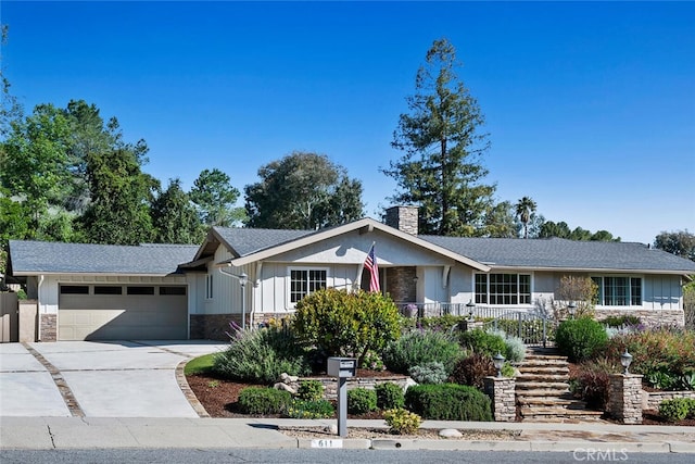 ranch-style home featuring a garage